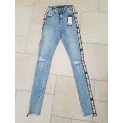 skinny jeans blauw met streep aan de zijkant maat 34/XS